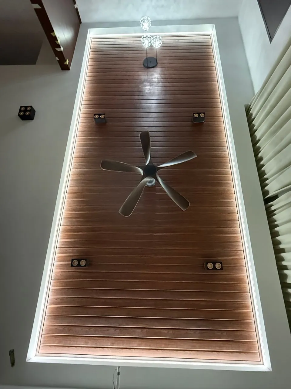 Wood grain PVC ceiling with cove lighting