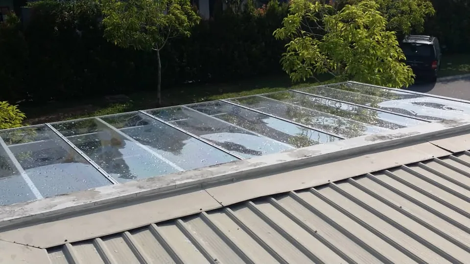 Clear polycarbonate skylight on a metal roof