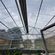 Clear corrugated polycarbonate roof on a steel frame